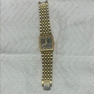Seiko Gold and Black Men's Watch includes date
